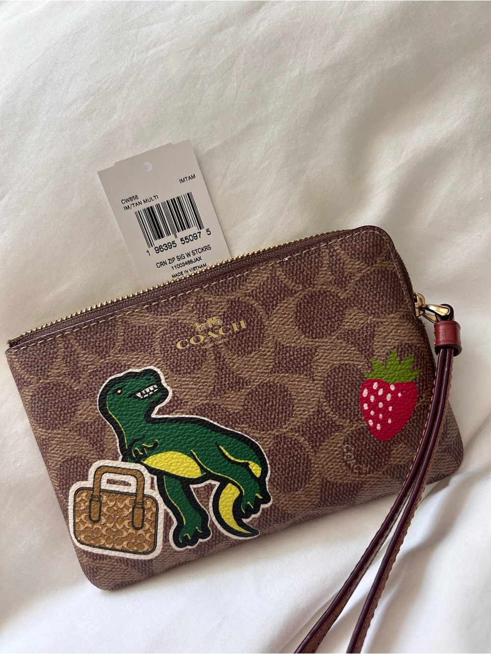 Coach Brown Signature Wristlet with Green Dinosaur Patch
